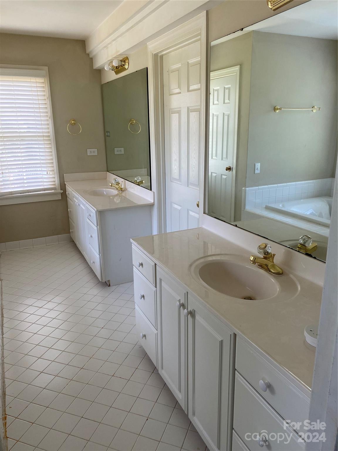 1623 Caille Court Fort Mill, SC 29708 - Photo 29 of 41 a bathroom with a double vanity sink mirror and bathtub