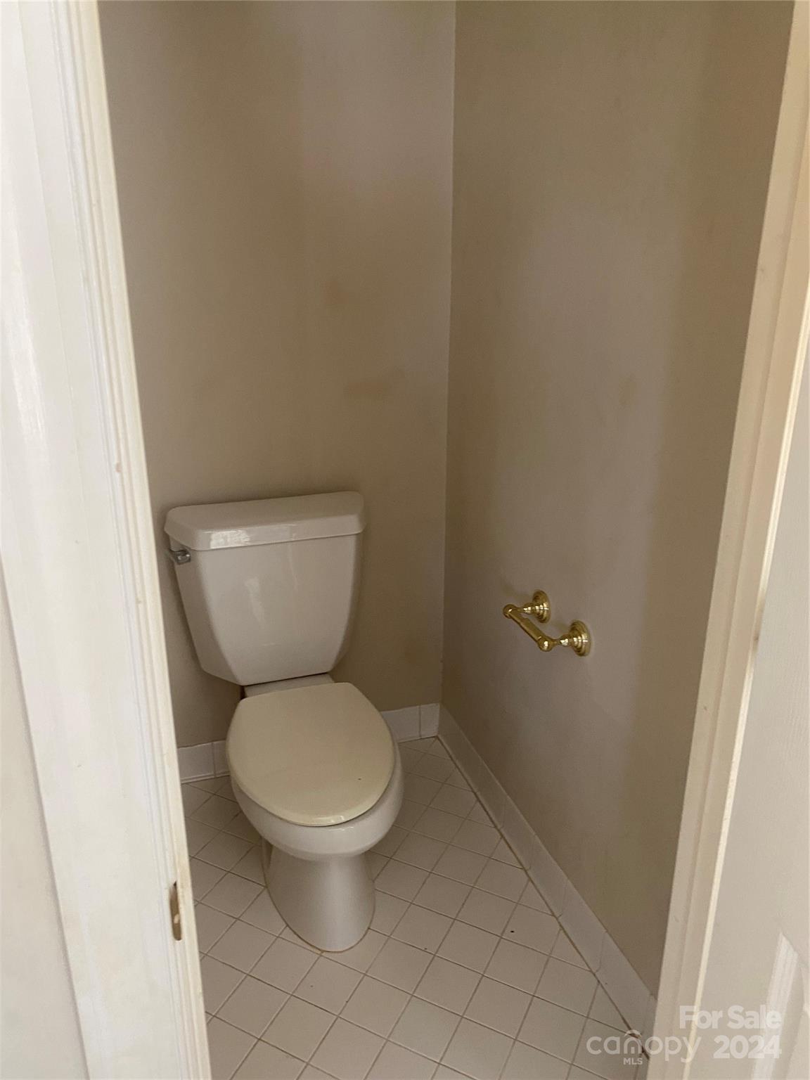 1623 Caille Court Fort Mill, SC 29708 - Photo 31 of 41 a white toilet sitting next to a shower