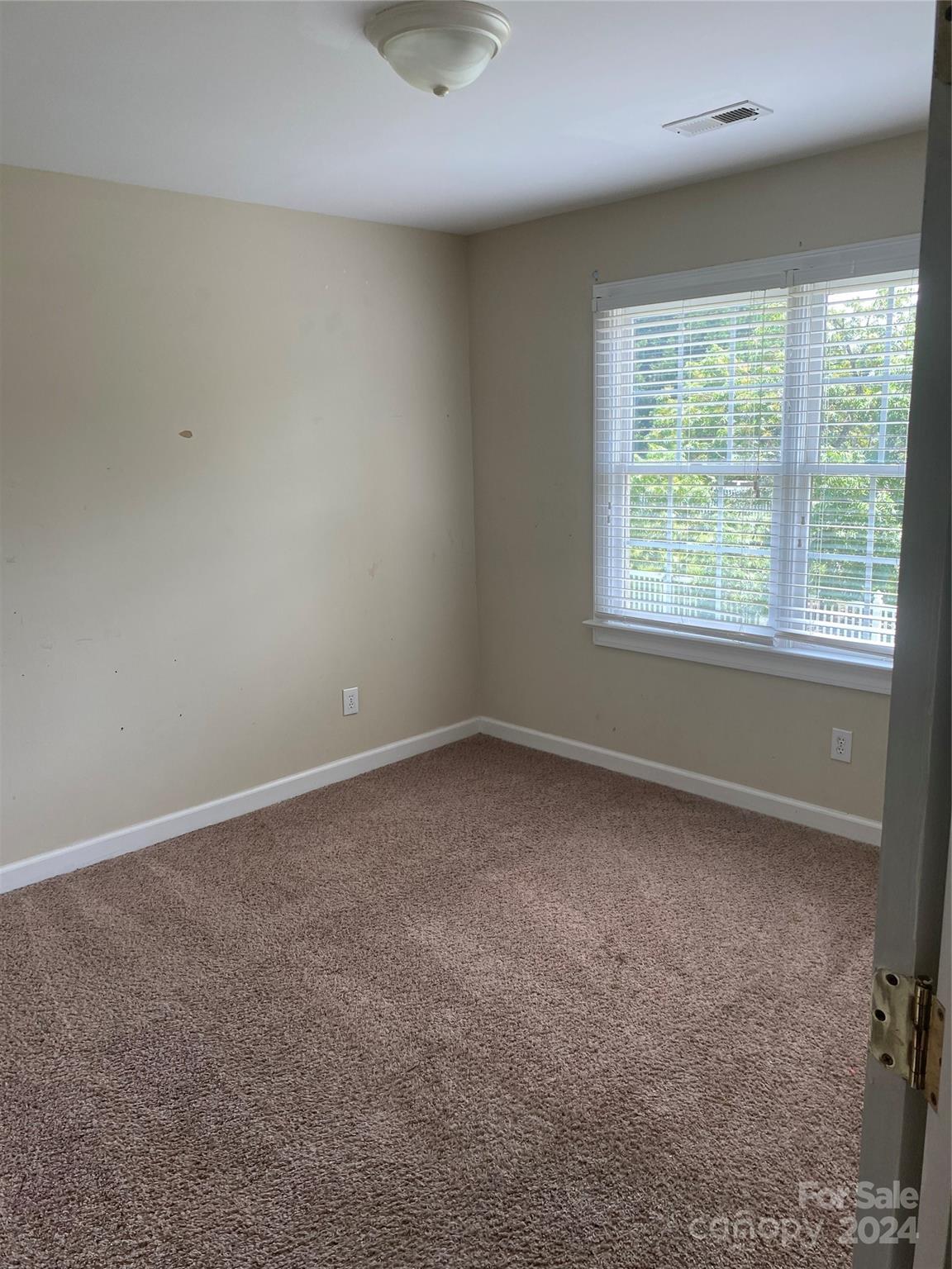 1623 Caille Court Fort Mill, SC 29708 - Photo 34 of 41 an empty room with a window