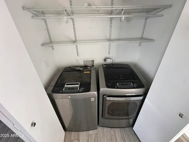 a utility room with dryer and washer