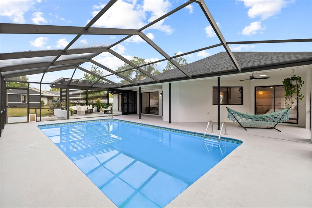 13269 Don Loop Spring Hill, FL 34609 - Photo 38 of 51 a view of swimming pool with seating area