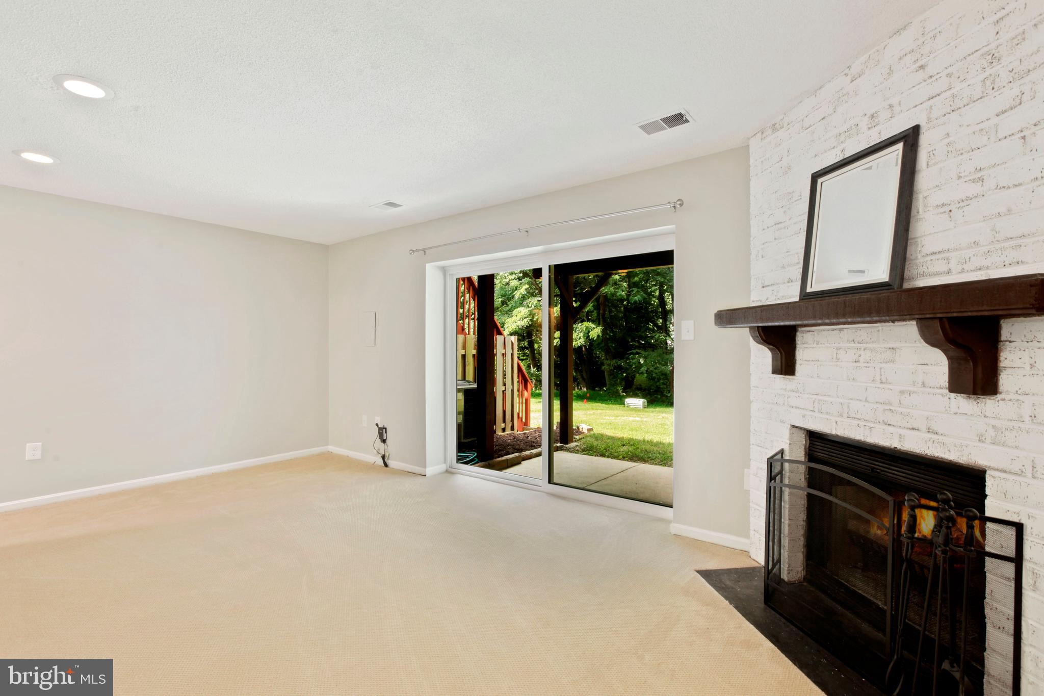 11366 Baroque Road Silver Spring, MD 20901 - Photo 21 of 26 Wood Burning Fireplace, leads to yard