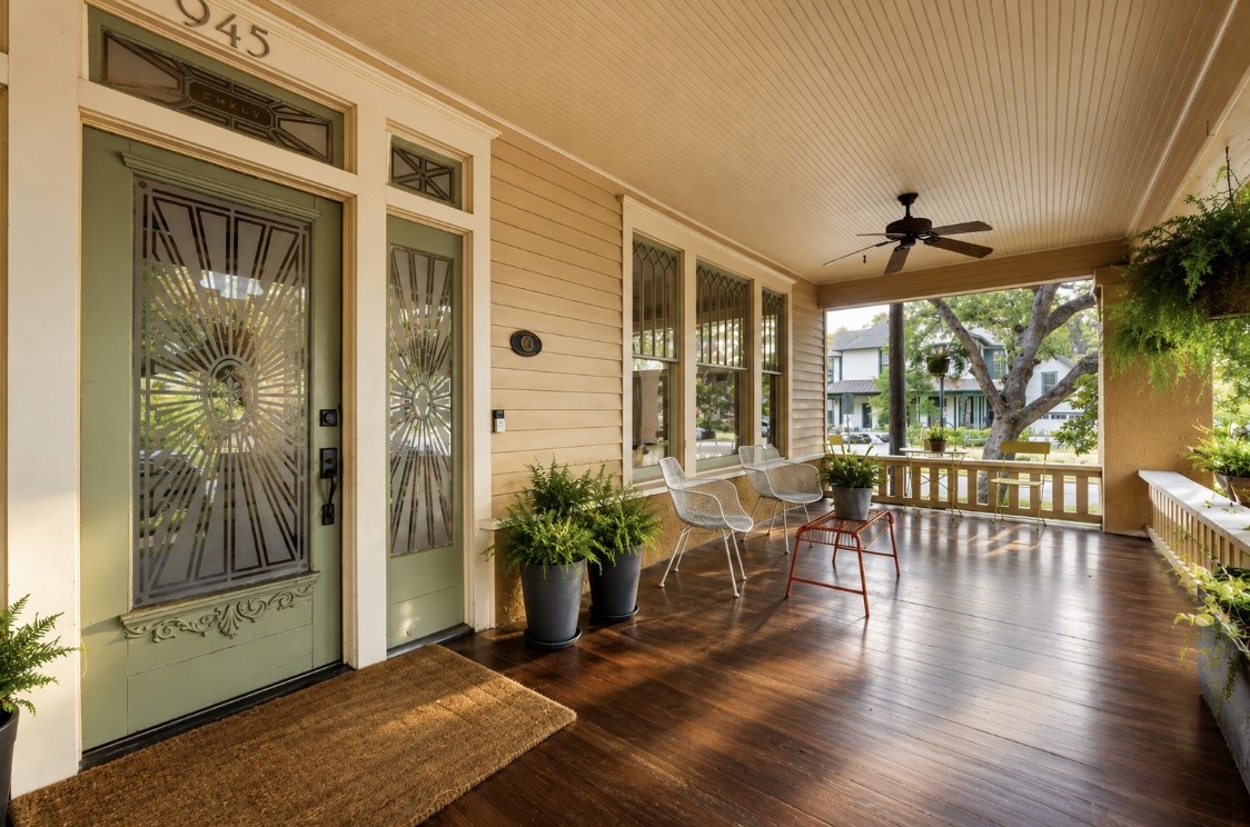 945 Harvard Street Houston, TX 77008 - Photo 2 of 47 Experience the charm of this neighborhood from your expansive, beautifully stained porch—perfect for morning coffee as the community comes to life.