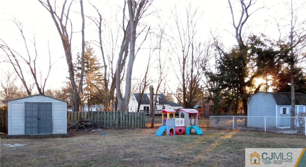 23 Ramsey Road Middlesex, NJ 08846 - Photo 5 of 6 a view of outdoor space with trampoline