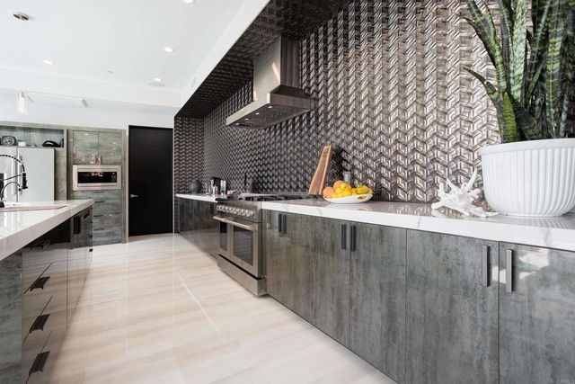a living room with lots of furniture and a flat screen tv