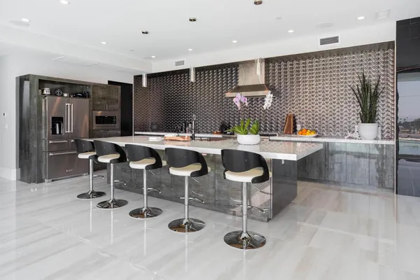 a living room with lots of furniture and a flat screen tv