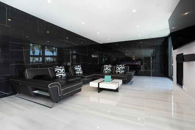 a terrace of a house with outdoor seating