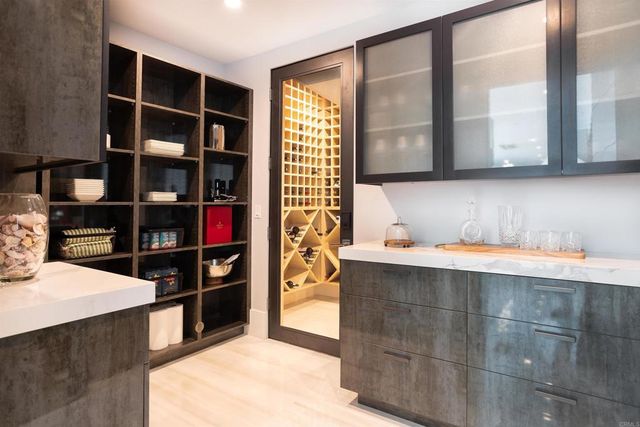 a view of a house with a swimming pool and a porch