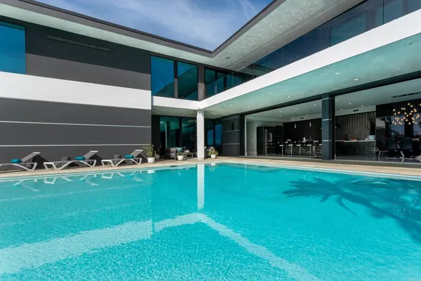 a living room with furniture and a large window