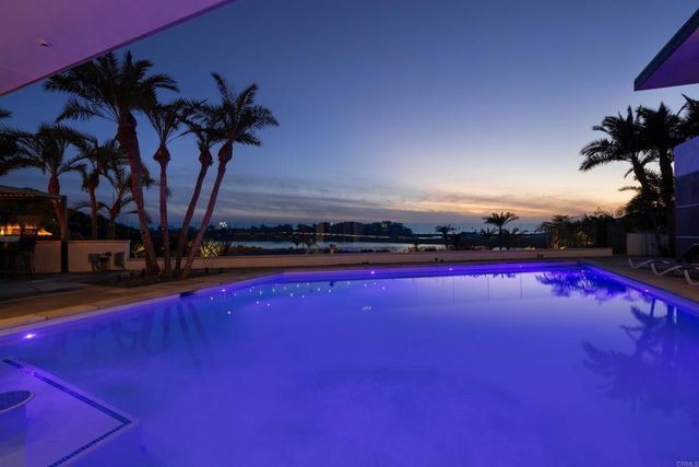 a bathroom with a sink double vanity and a mirror