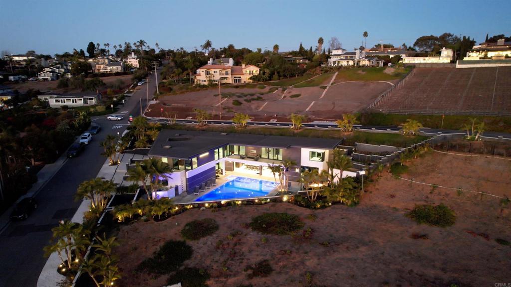 1095 Hoover Street Carlsbad, CA 92008 - Photo 72 of 75 an aerial view of a building with outdoor space