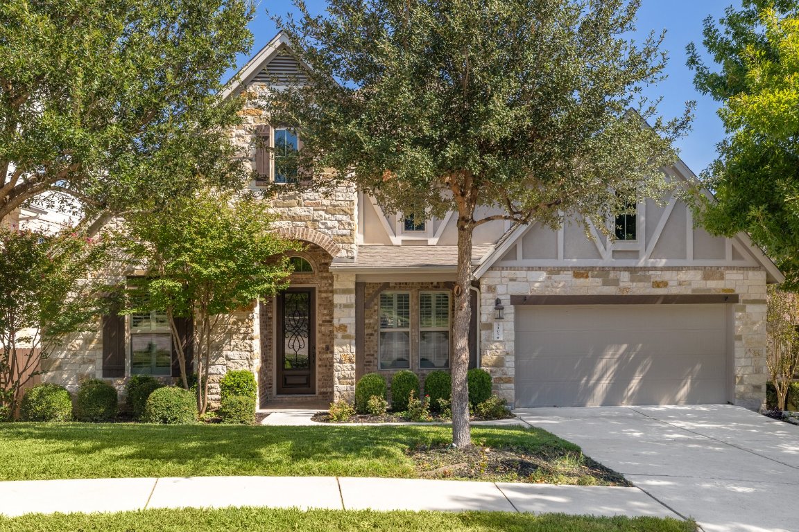 The quiet cul-de-sac setting makes the front of this home feel tucked away, while the craftsman detail and welcoming entry hint at just how special it is inside