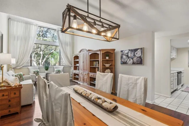a bathroom with a sink and mirror with toilet