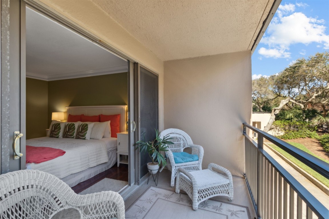 1163 Beach Walker Road, Unit 1163 Fernandina Beach, FL 32034 - Photo 23 of 52 a bedroom with furniture and a window