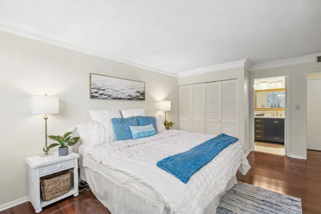 a view of a swimming pool and lounge chairs