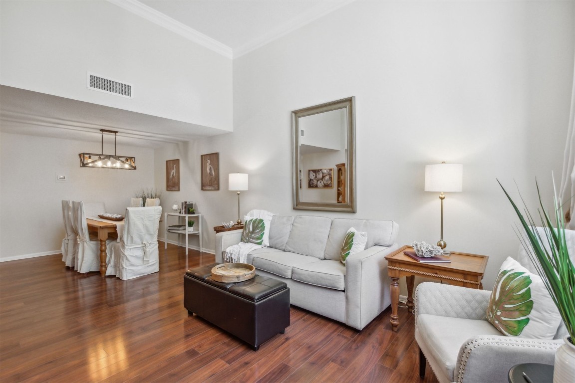 1163 Beach Walker Road, Unit 1163 Fernandina Beach, FL 32034 - Photo 10 of 52 a living room with furniture and a wooden floor