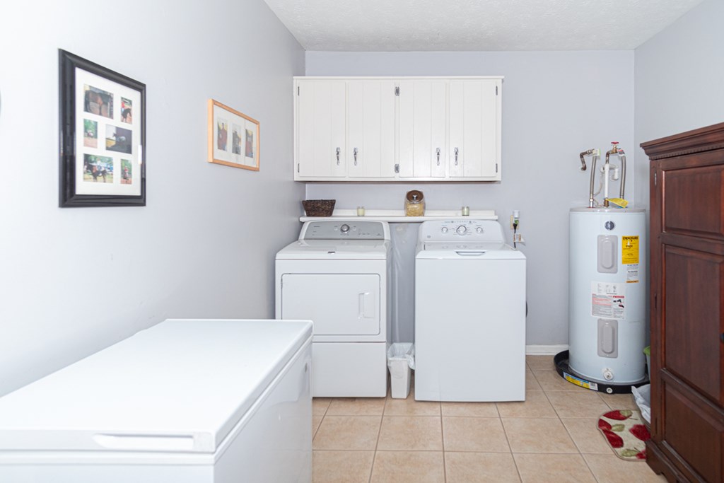 5399 Sandfort Road Seale, AL 36875 - Photo 12 of 33 a utility room with dryer and washer