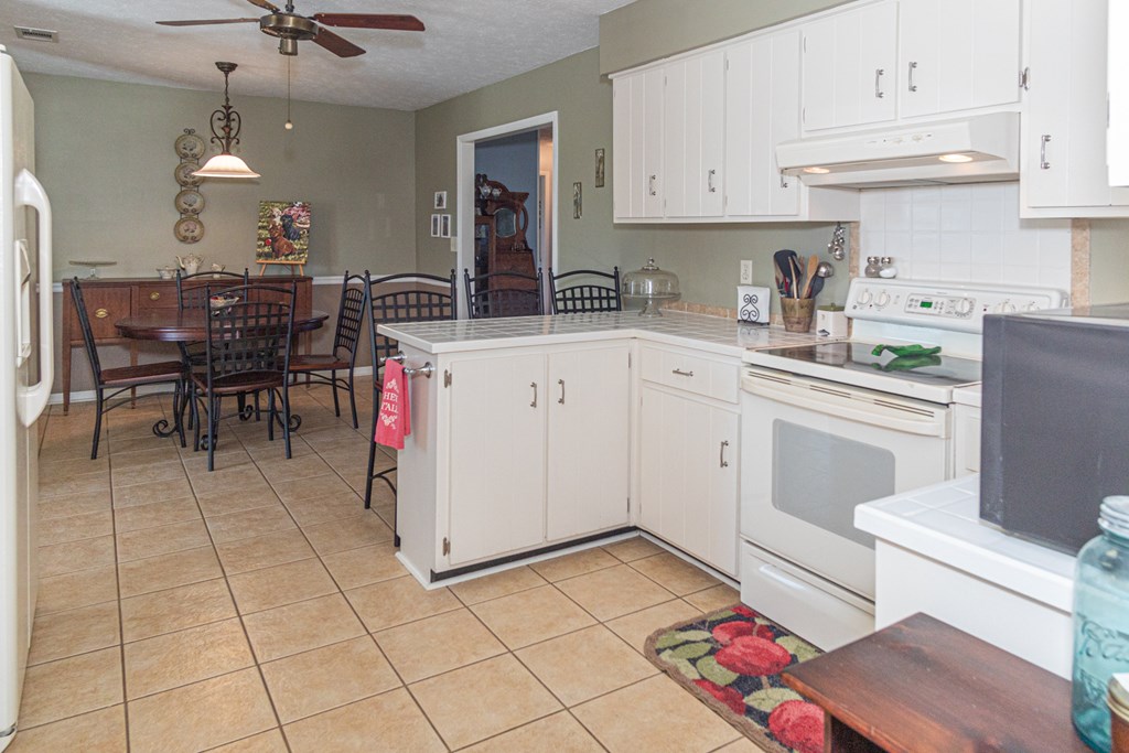 5399 Sandfort Road Seale, AL 36875 - Photo 6 of 33 a kitchen with a sink cabinets and window