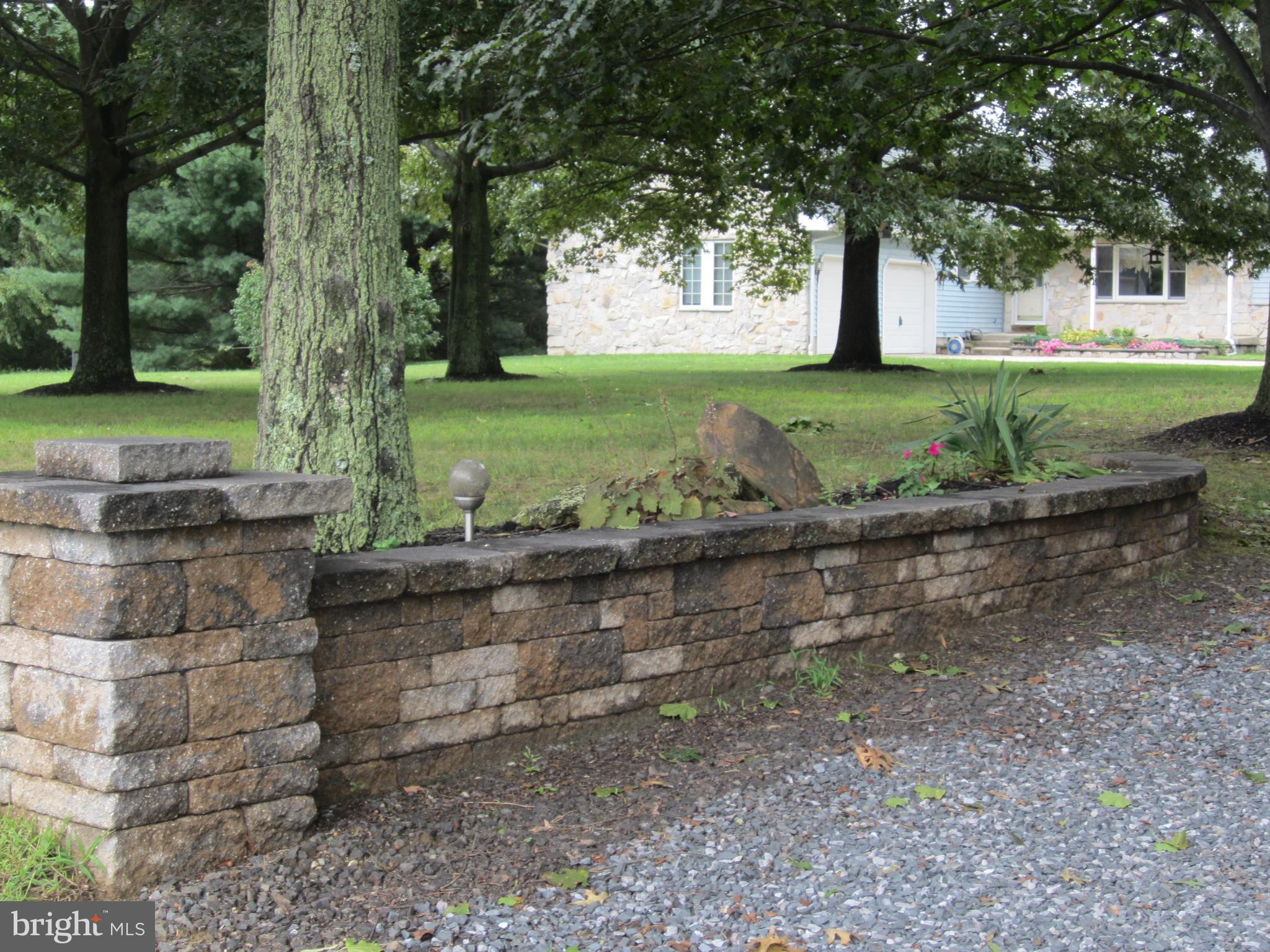 348 Eayrestown Road Southampton, NJ 08088 - Photo 2 of 32 a view of a garden with a tree