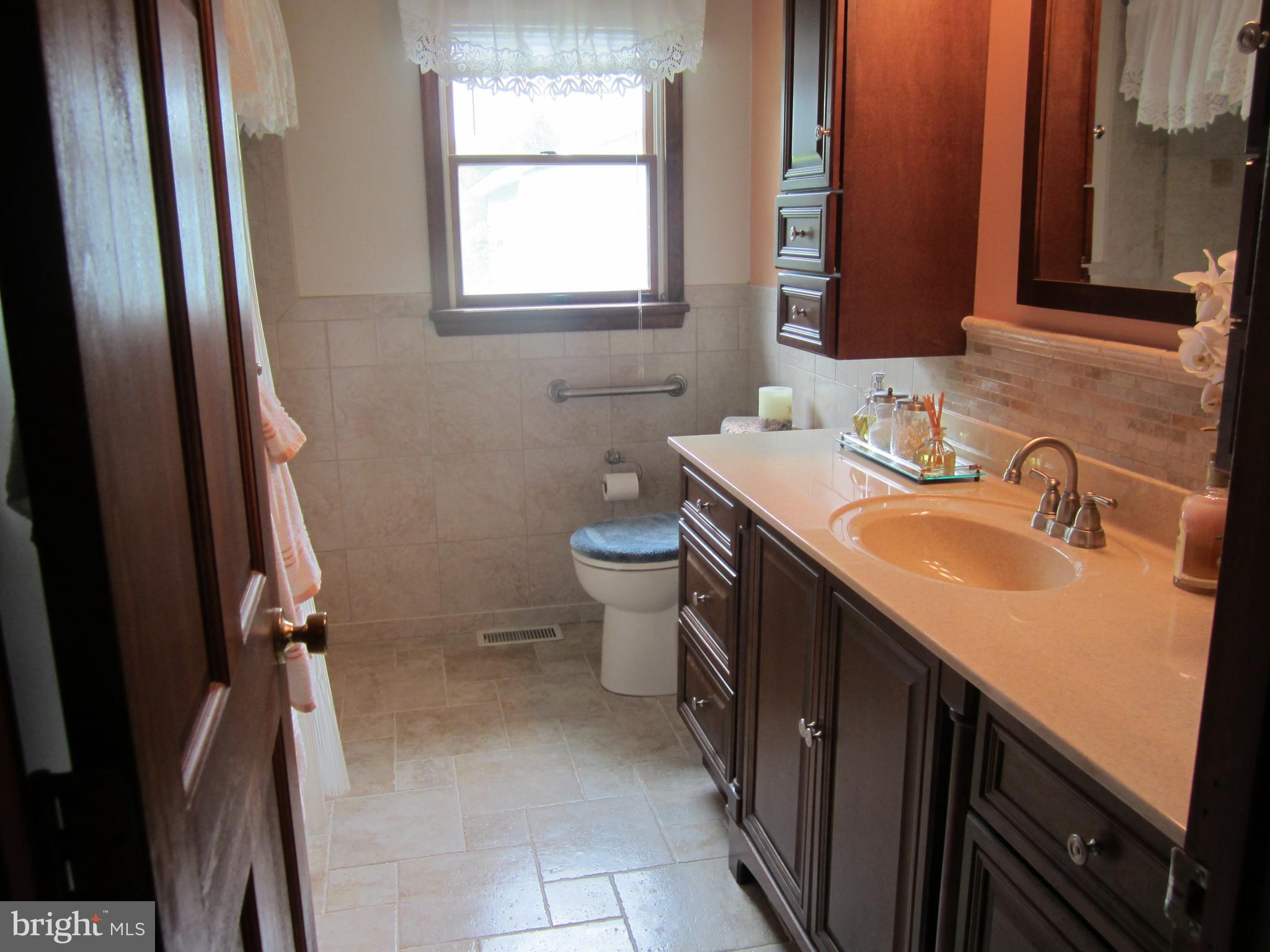 348 Eayrestown Road Southampton, NJ 08088 - Photo 16 of 32 a bathroom with a sink toilet and mirror