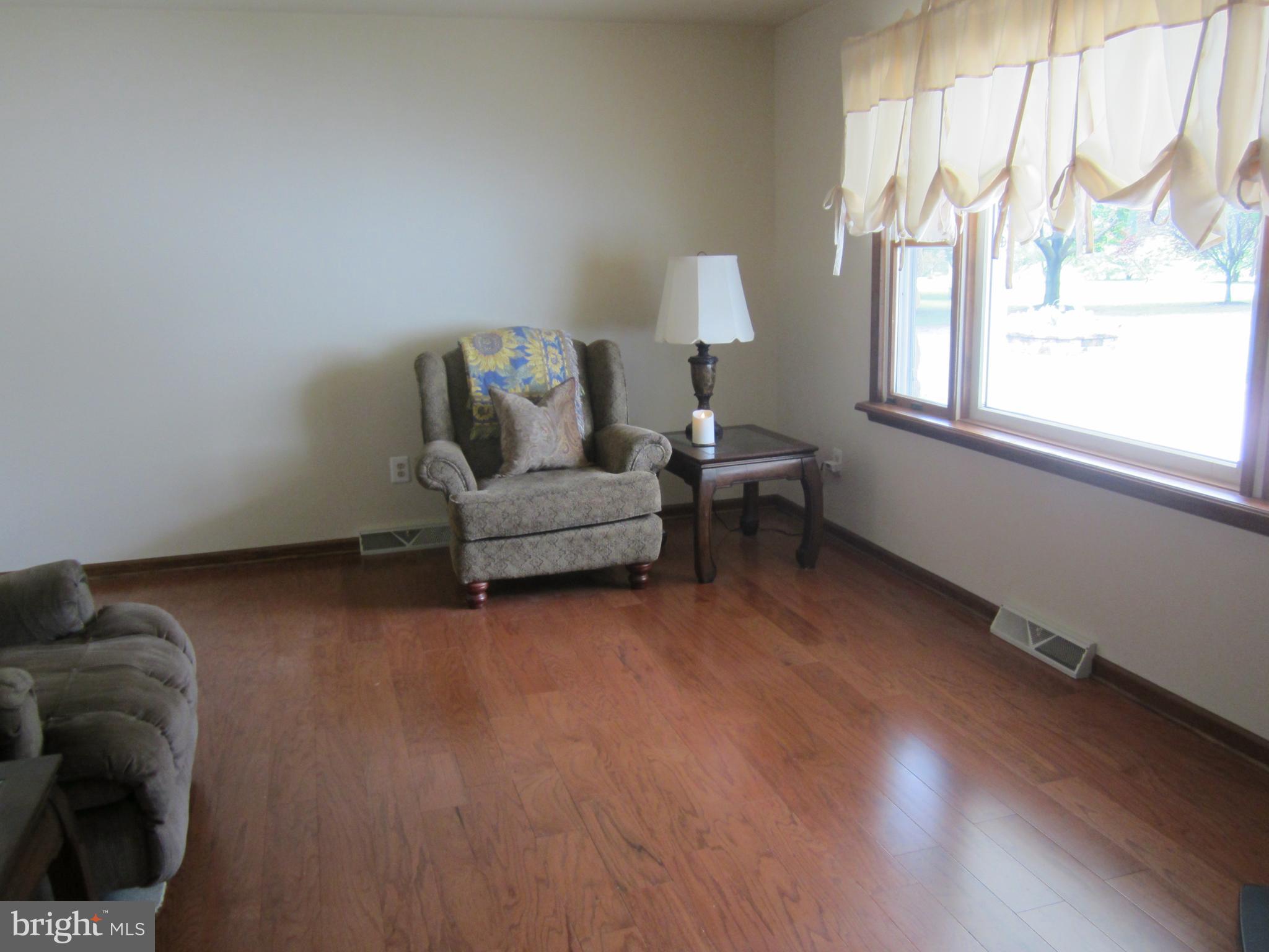 348 Eayrestown Road Southampton, NJ 08088 - Photo 3 of 32 a living room with furniture and a wooden floor