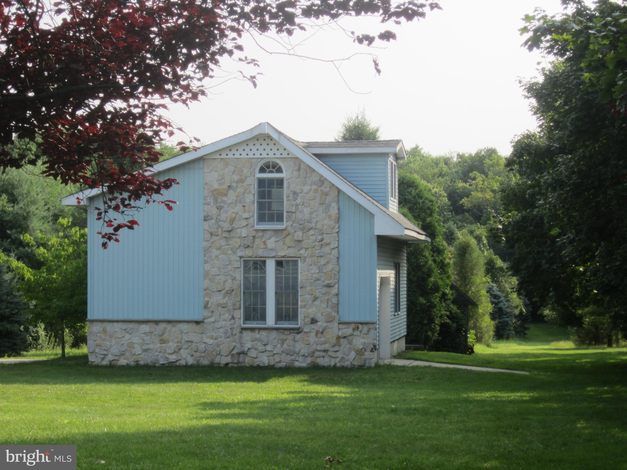 348 Eayrestown Road Southampton, NJ 08088 - Photo 29 of 32 a front view of a house with a garden