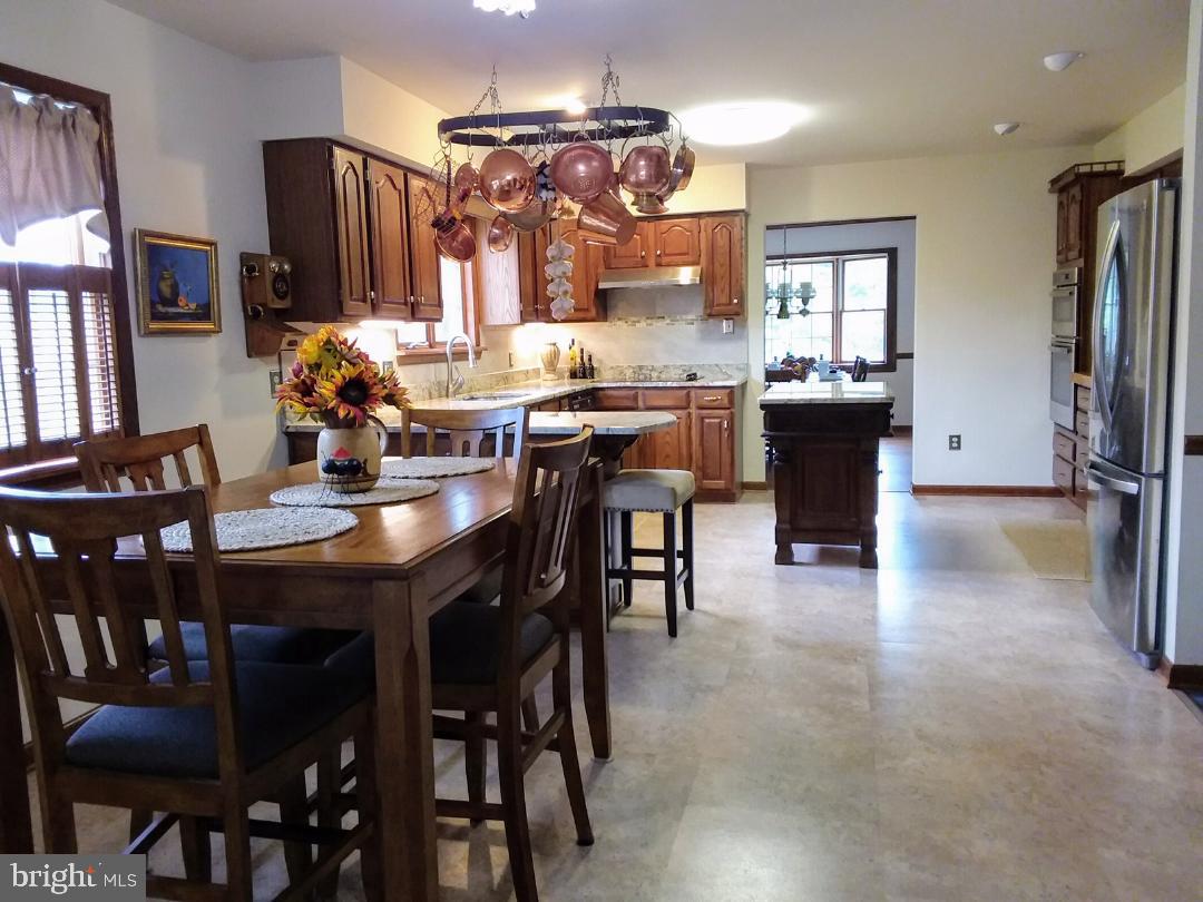 348 Eayrestown Road Southampton, NJ 08088 - Photo 8 of 32 a view of a dining room with furniture