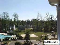 9127 Washam Potts Road, Unit 9127 Cornelius, NC 28031 - Photo 8 of 8 a view of lake