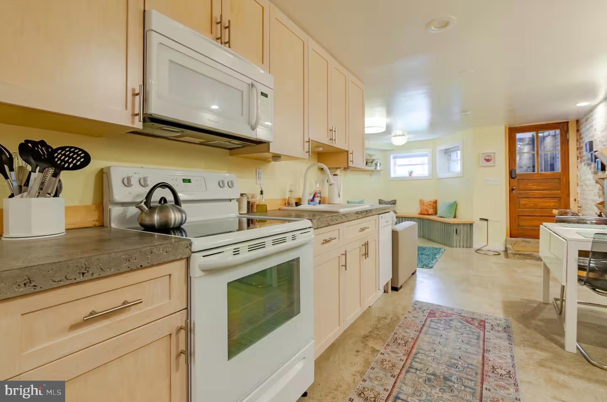 33 Q Street Northeast Washington, DC 20002 - Photo 22 of 28 Basement kitchen, w/ concrete counters