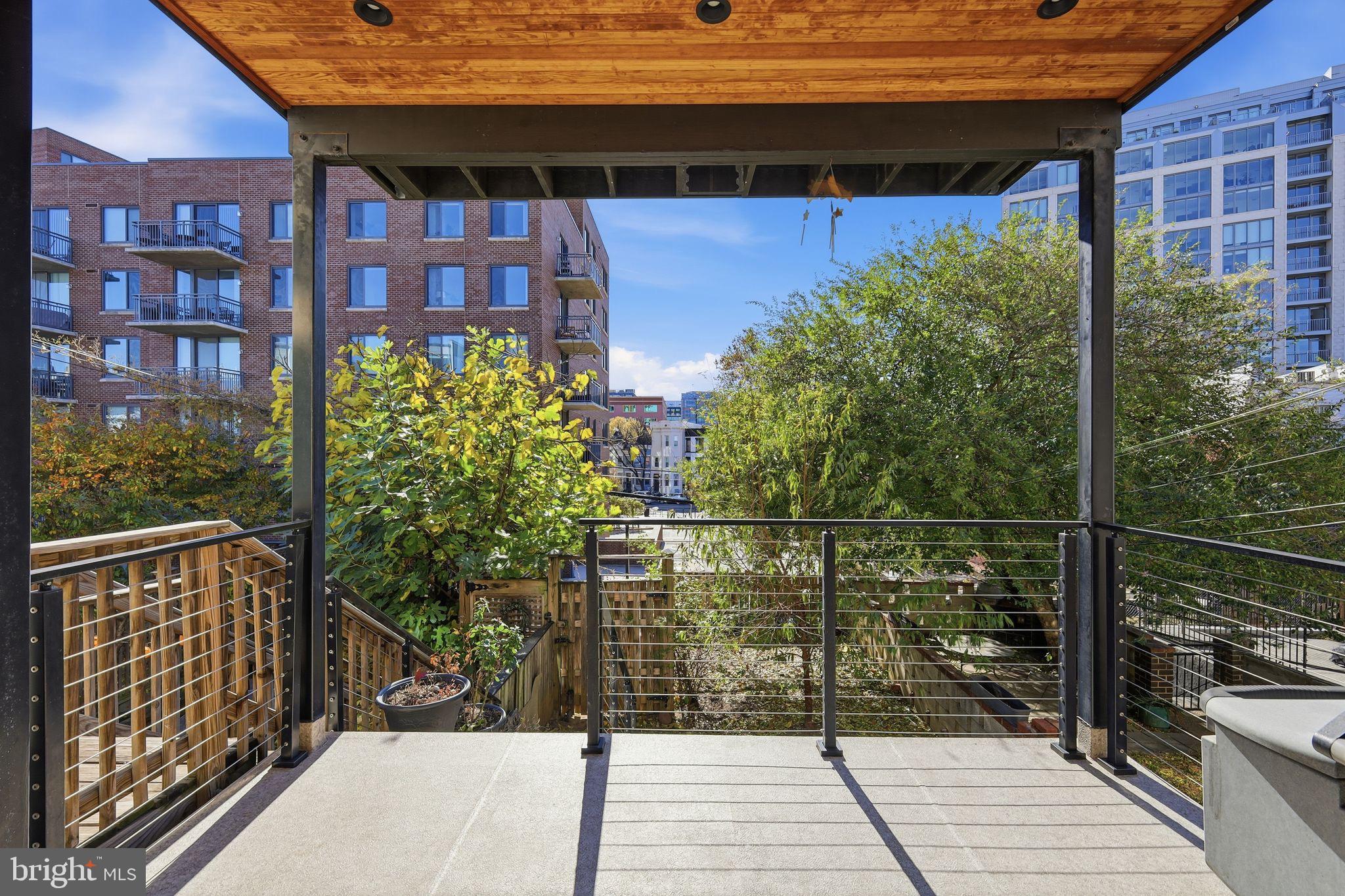 33 Q Street Northeast Washington, DC 20002 - Photo 4 of 28 Covered Deck with green space