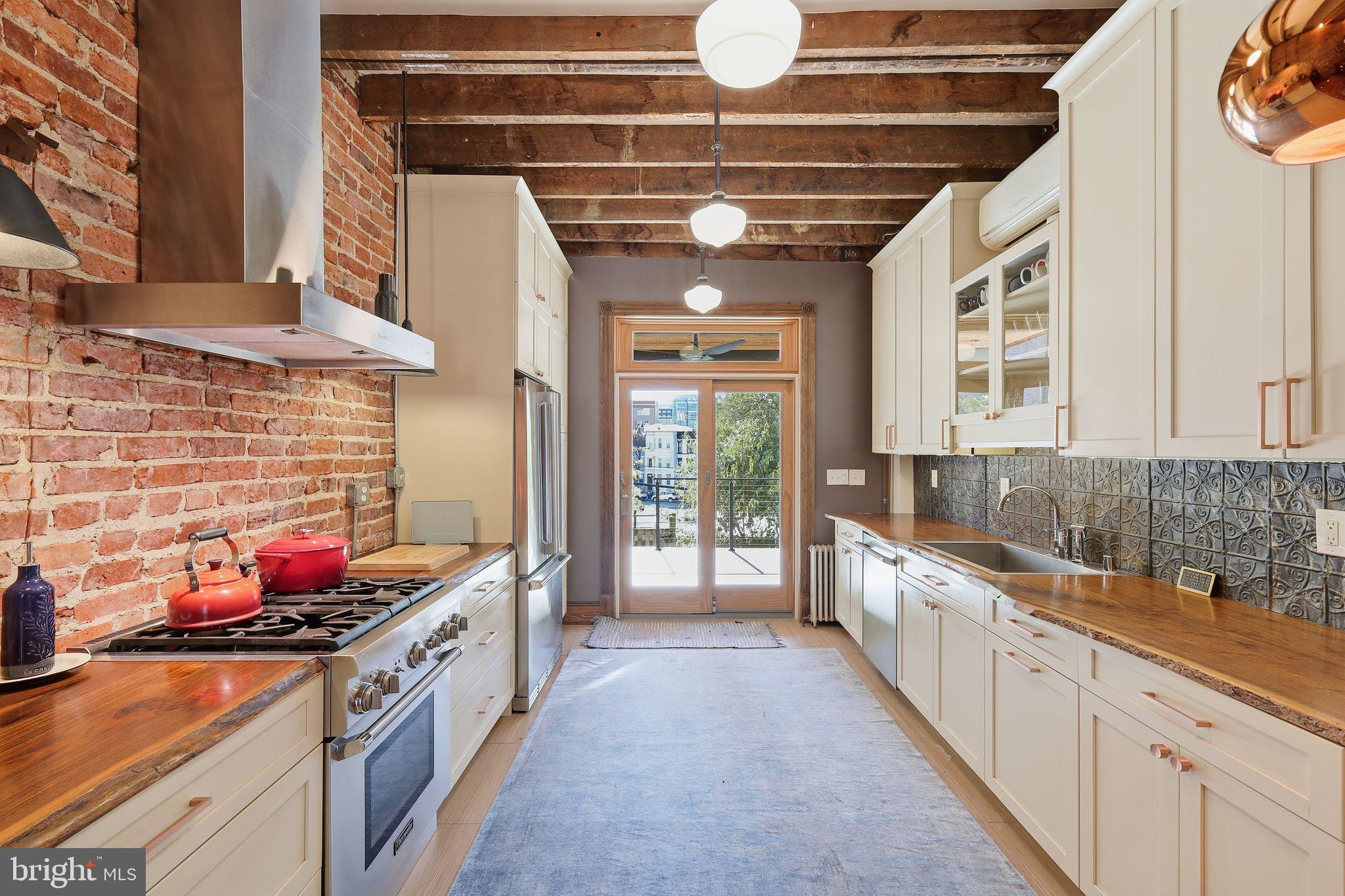 33 Q Street Northeast Washington, DC 20002 - Photo 6 of 28 Spectacular modern kitchen w/ exposed beams