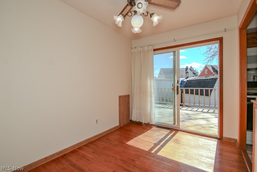 30224 Regent Road Wickliffe, OH 44092 - Photo 9 of 27 Empty room featuring light wood-style floors and a ceiling fan