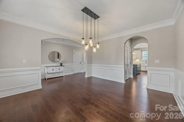 a view of livingroom with hardwood floor and a ceiling fan