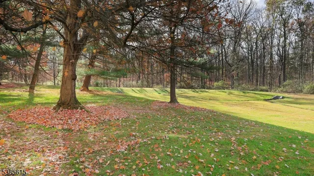 a view of a playground with basketball court