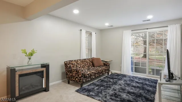 a bedroom with a bed and a fireplace