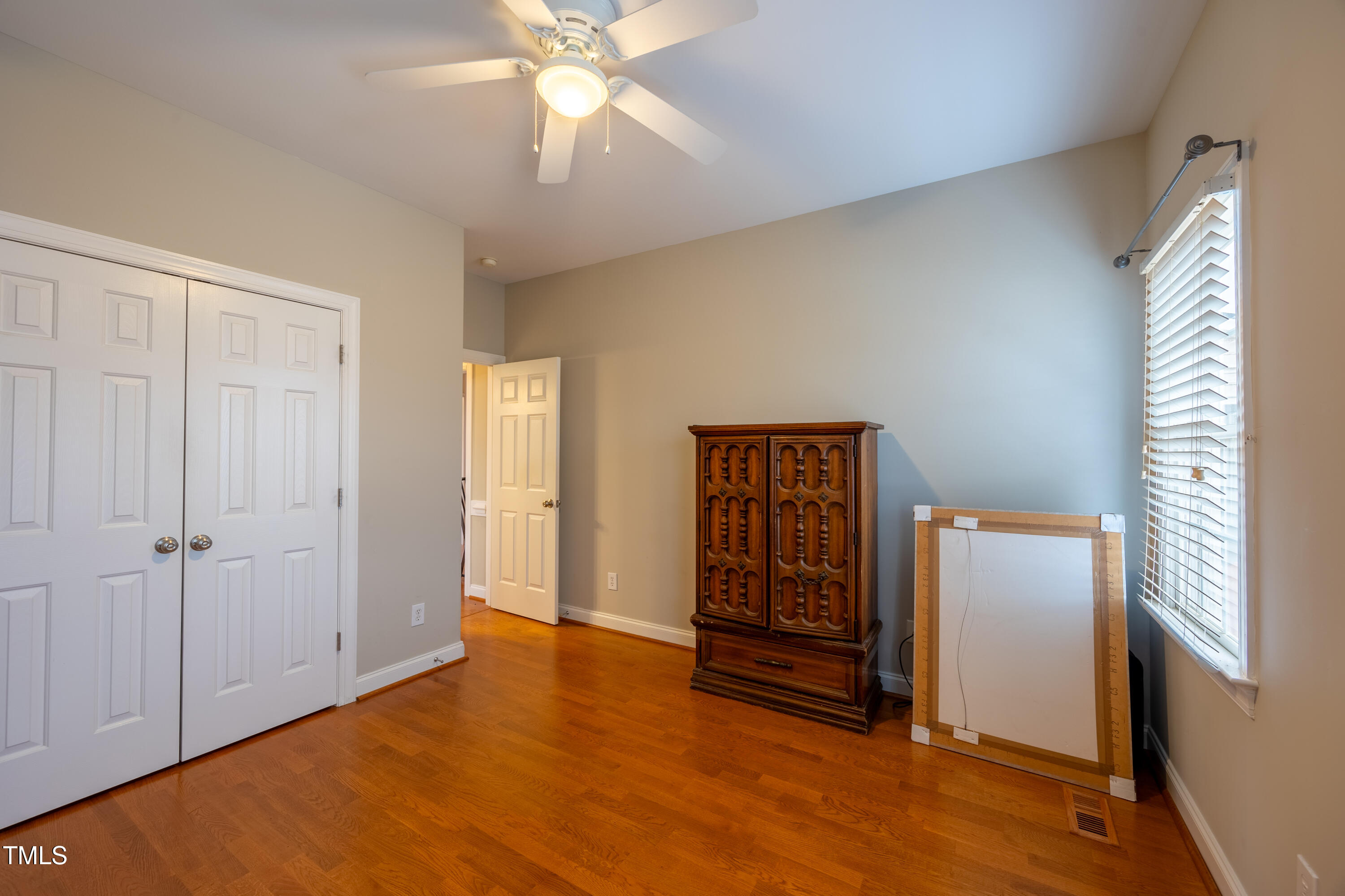 5148 Nowell Road Sims, NC 27880 - Photo 14 of 49 wooden floor in an empty room with a window