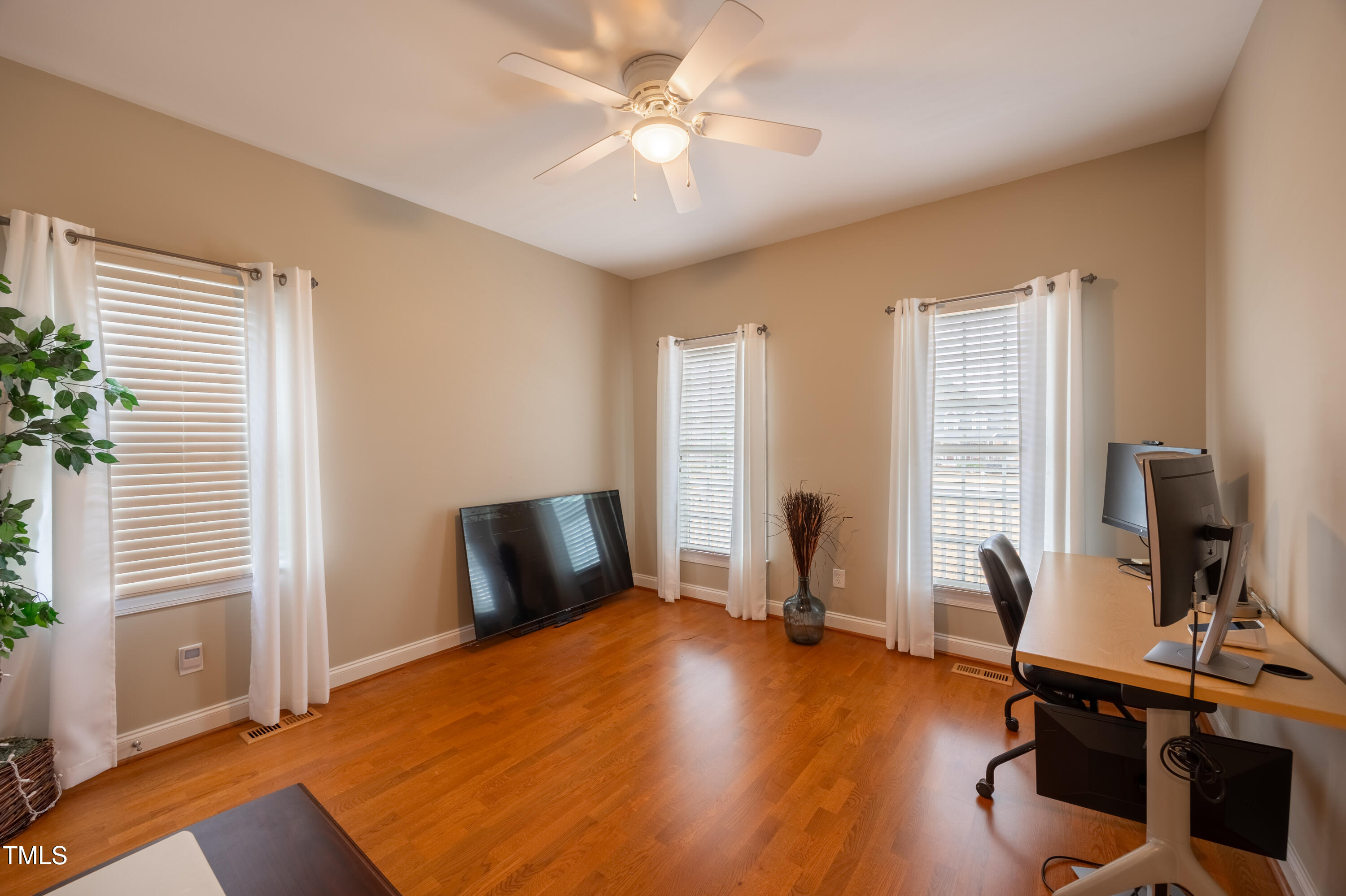 5148 Nowell Road Sims, NC 27880 - Photo 17 of 49 a bedroom with bed and a chair