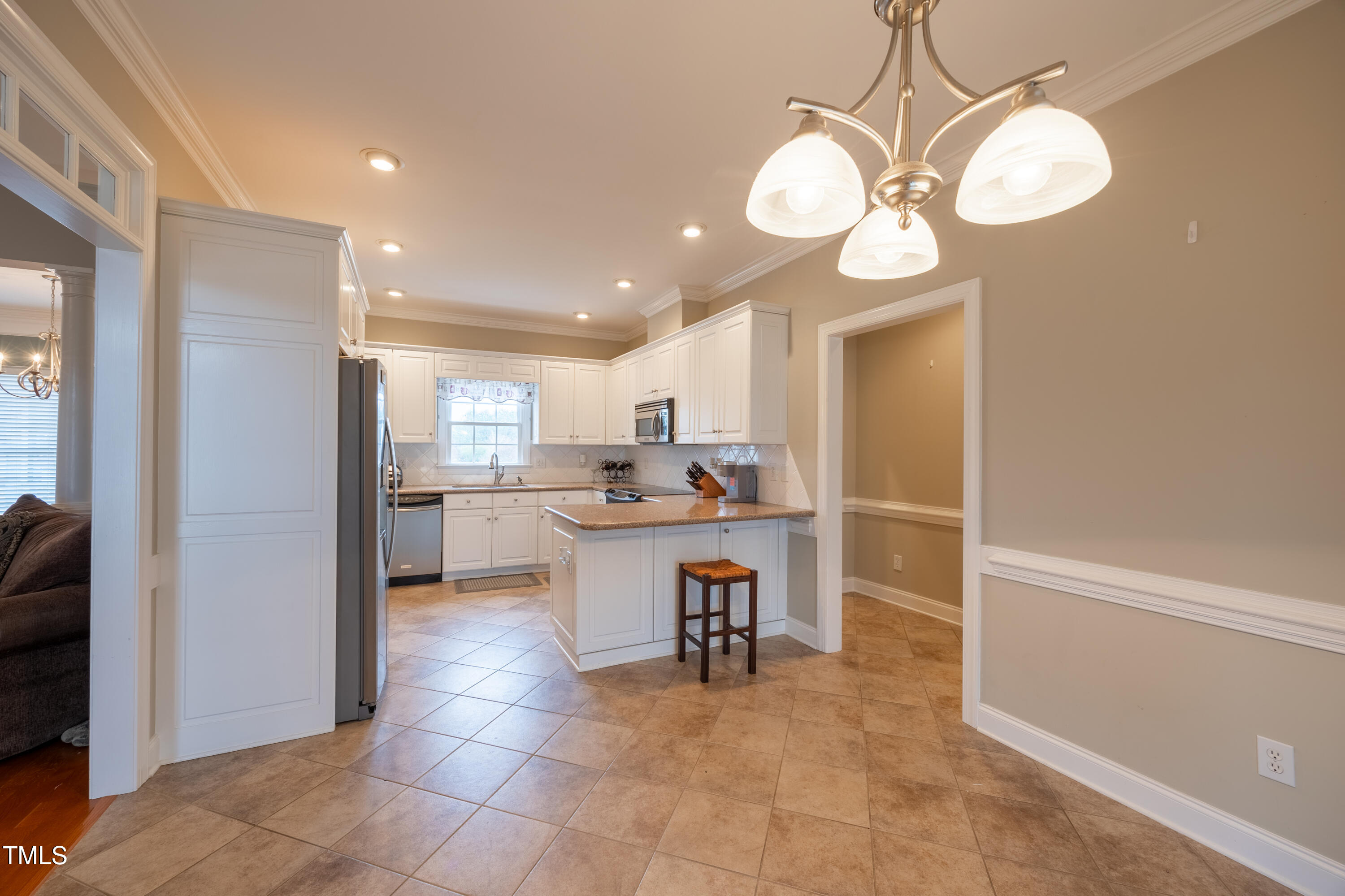 5148 Nowell Road Sims, NC 27880 - Photo 23 of 49 a kitchen with a refrigerator and a sink
