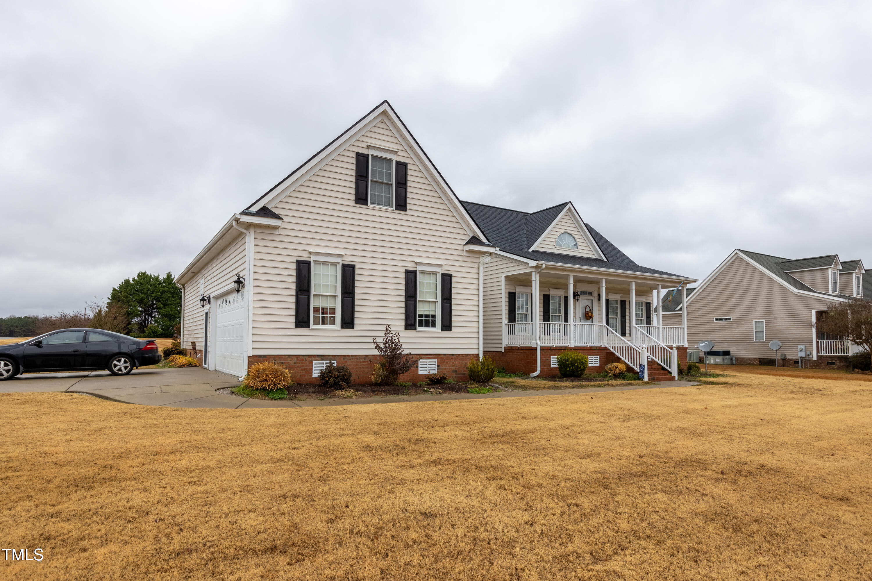 5148 Nowell Road Sims, NC 27880 - Photo 3 of 49 a front view of a house with a yard