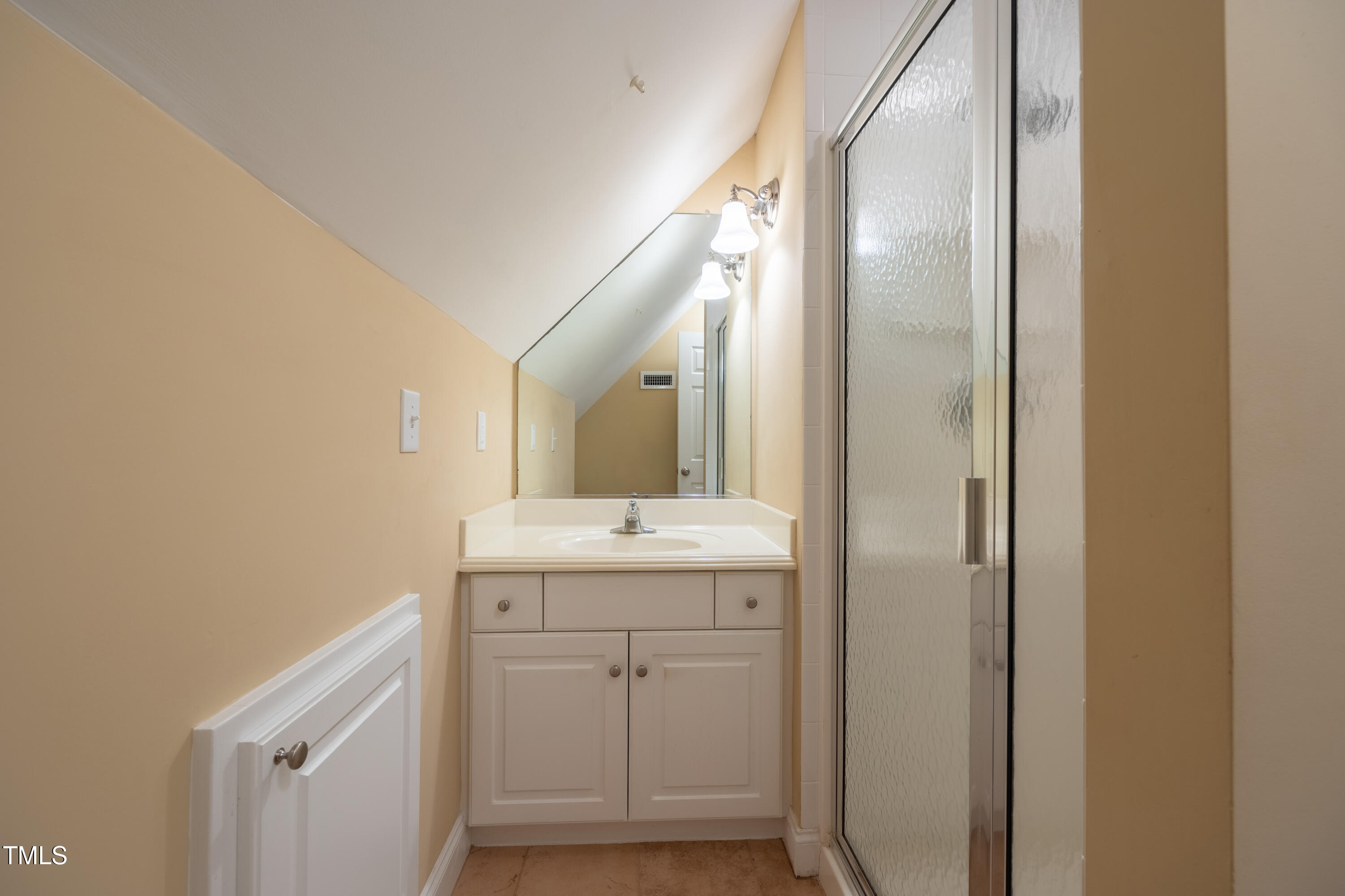 5148 Nowell Road Sims, NC 27880 - Photo 41 of 49 a bathroom with a granite countertop sink and a mirror