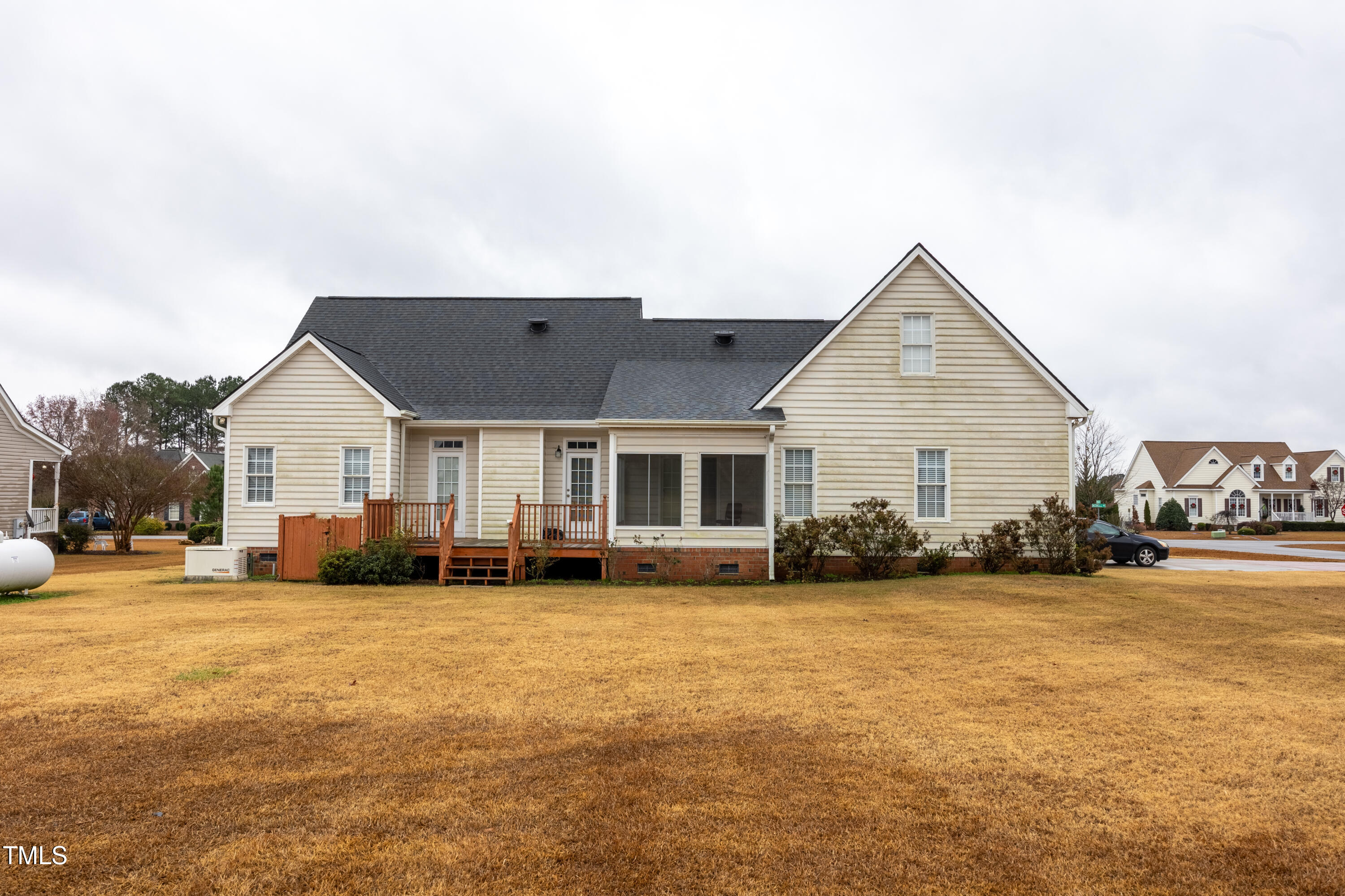 5148 Nowell Road Sims, NC 27880 - Photo 48 of 49 a view of a house with a yard and large trees