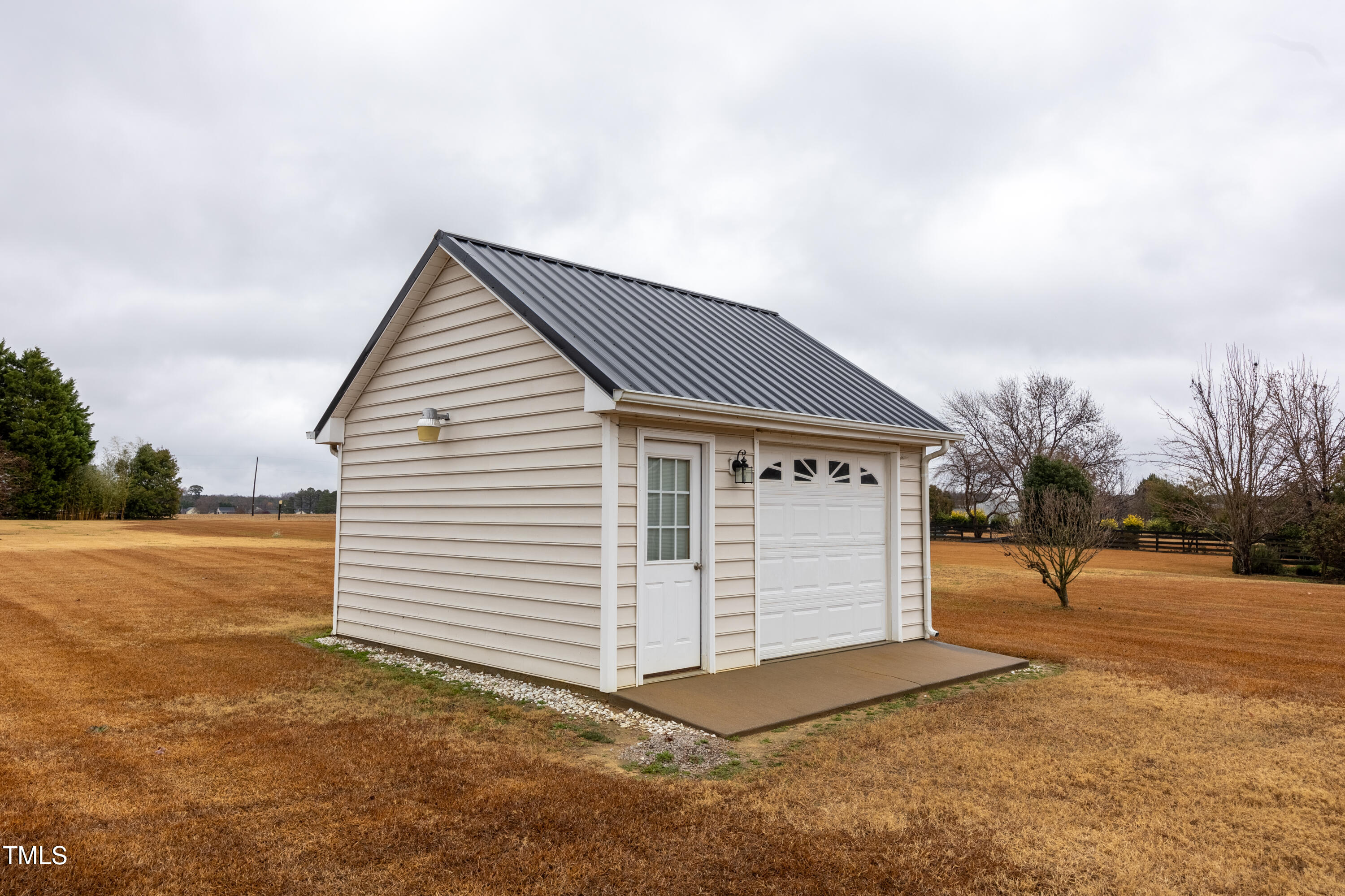 5148 Nowell Road Sims, NC 27880 - Photo 49 of 49 a view of a white house with a yard