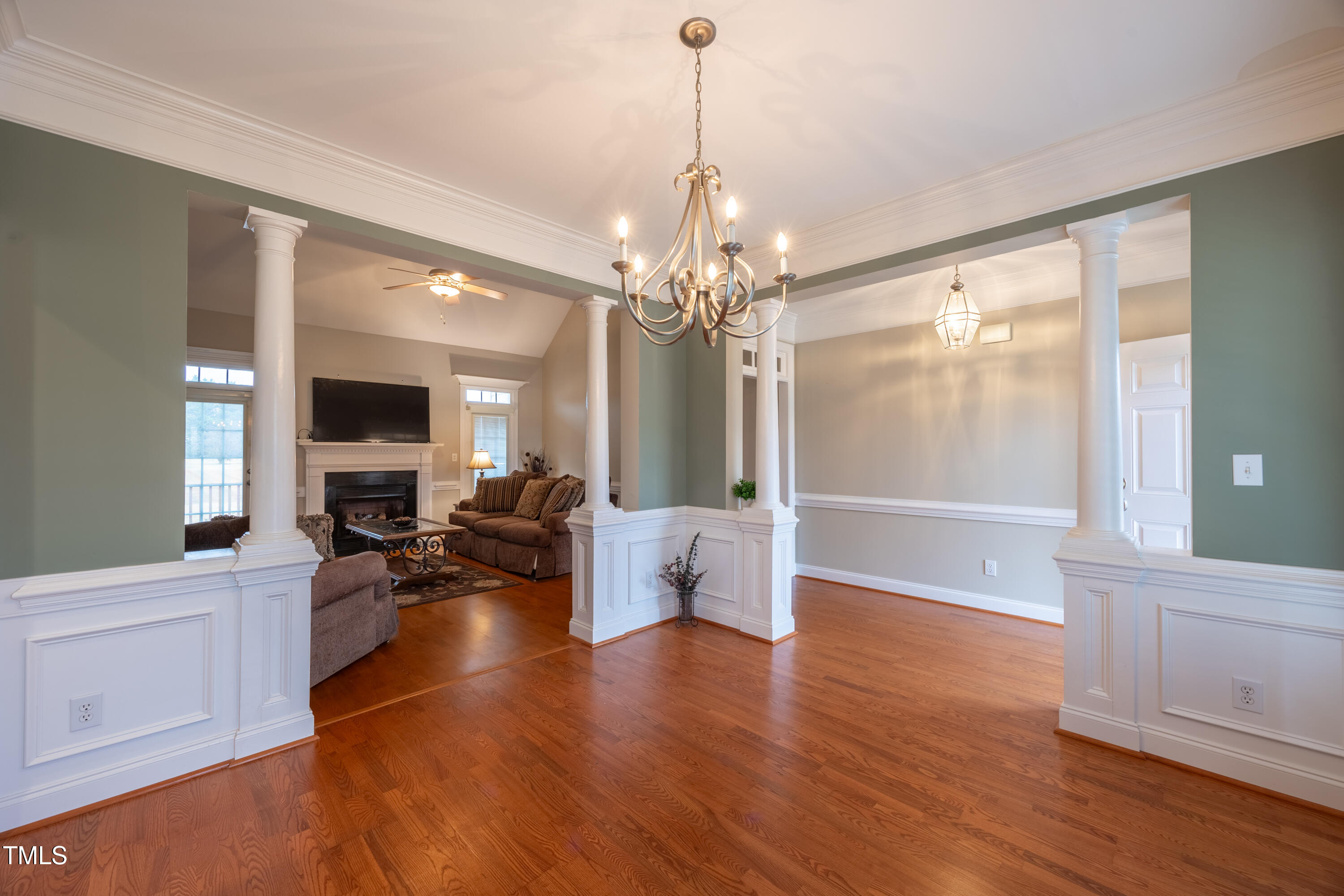 5148 Nowell Road Sims, NC 27880 - Photo 10 of 49 a living room with furniture and a chandelier