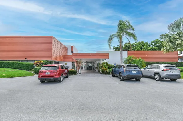 a car parked in front of a house