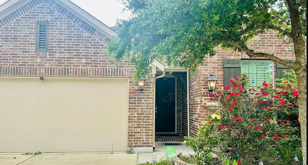 616 Garner Park Drive Georgetown, TX 78628 - Photo 2 of 26 Property entrance with brick siding and driveway