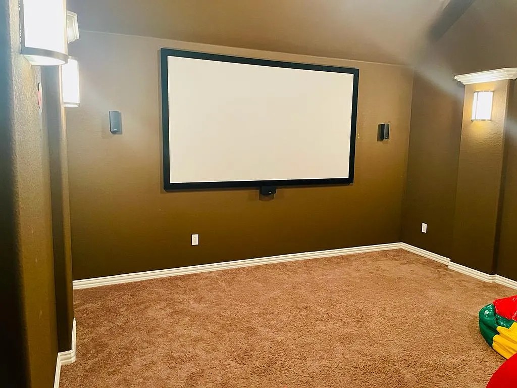 616 Garner Park Drive Georgetown, TX 78628 - Photo 20 of 26 Carpeted cinema with baseboards
