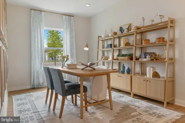 a view of a workspace with furniture