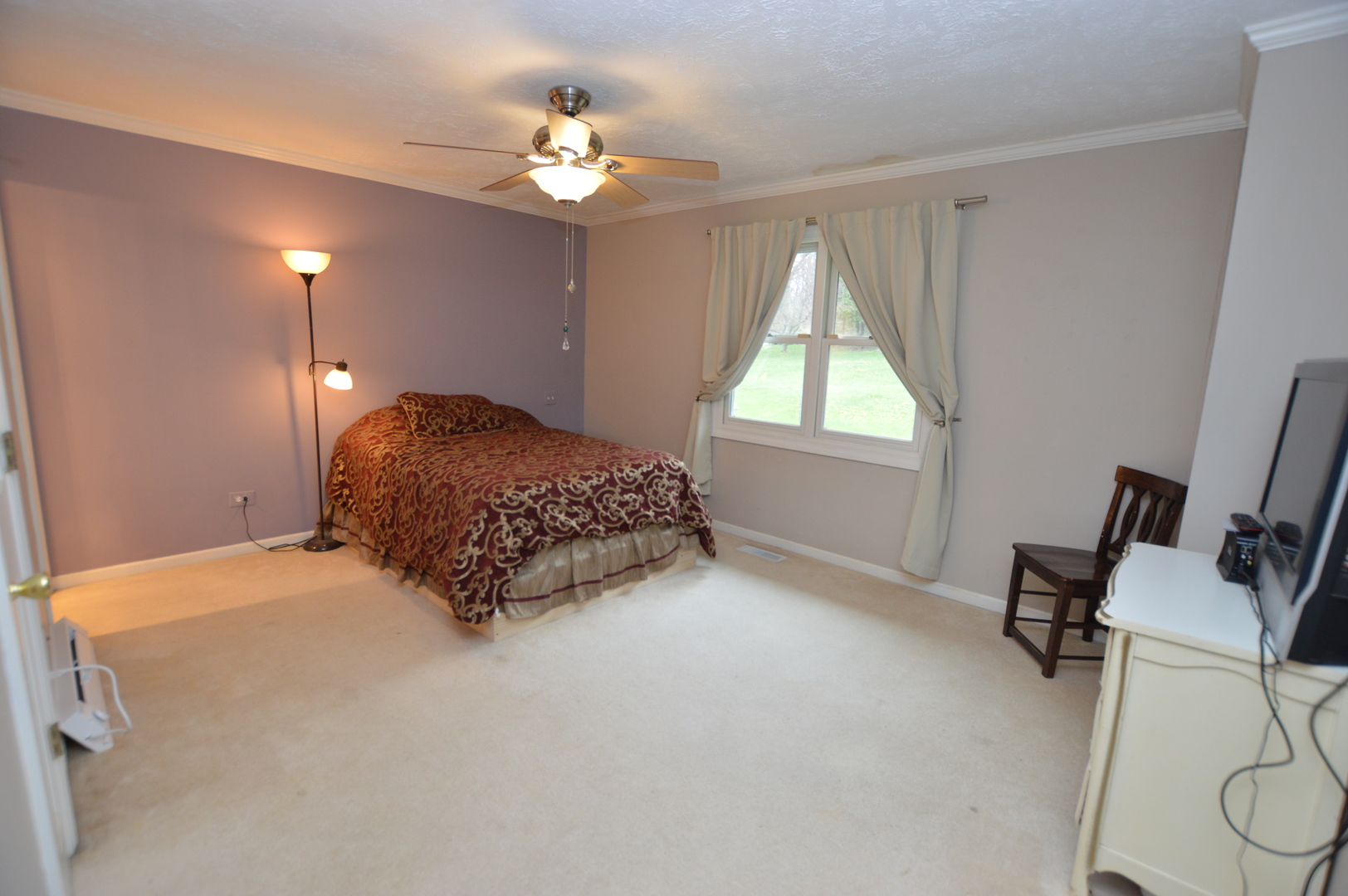 8607 Ferris Road Harvard, IL 60033 - Photo 24 of 48 a bedroom with a bed and a window