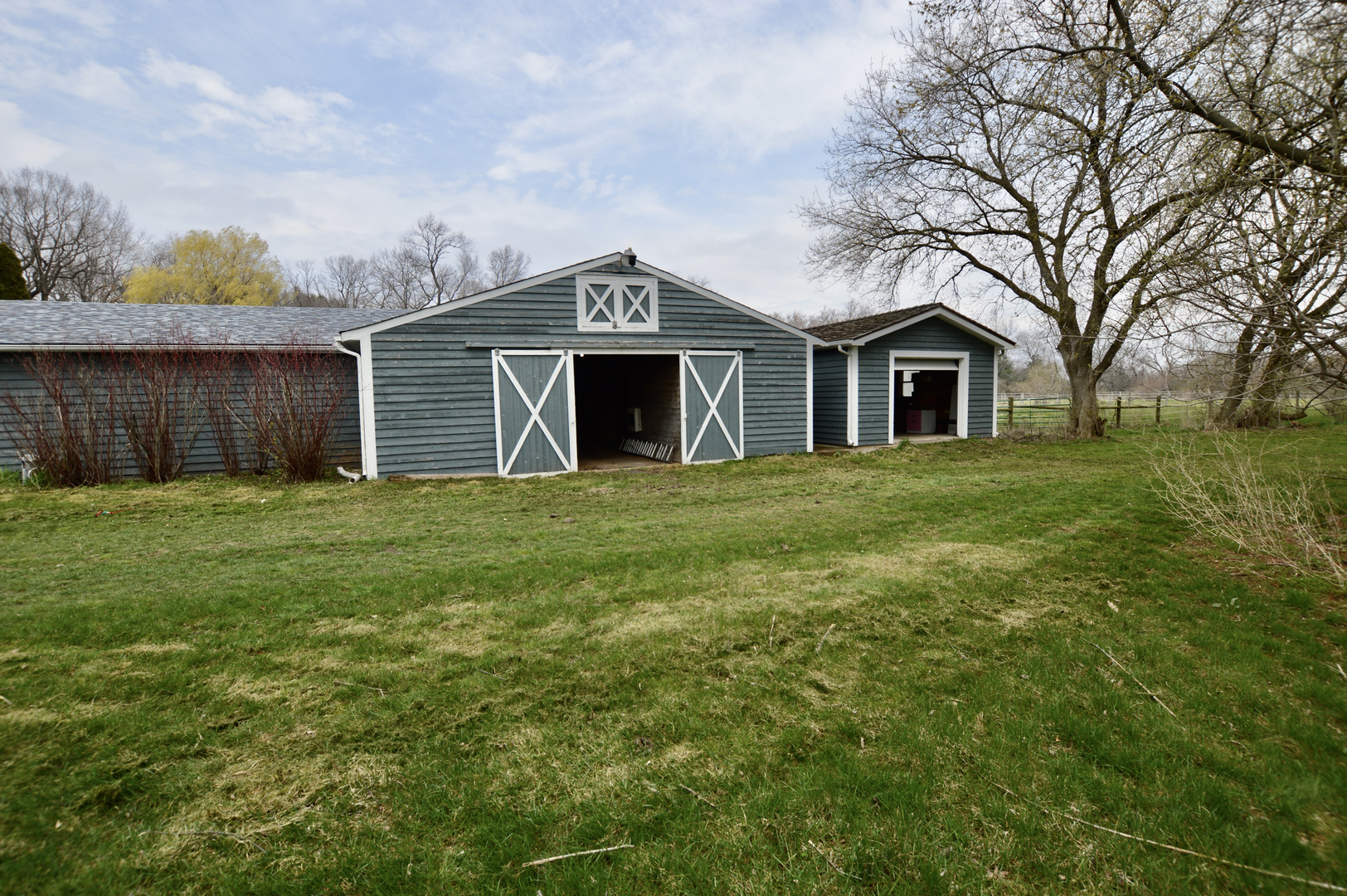 8607 Ferris Road Harvard, IL 60033 - Photo 39 of 48 a front view of house with yard and trees in the background