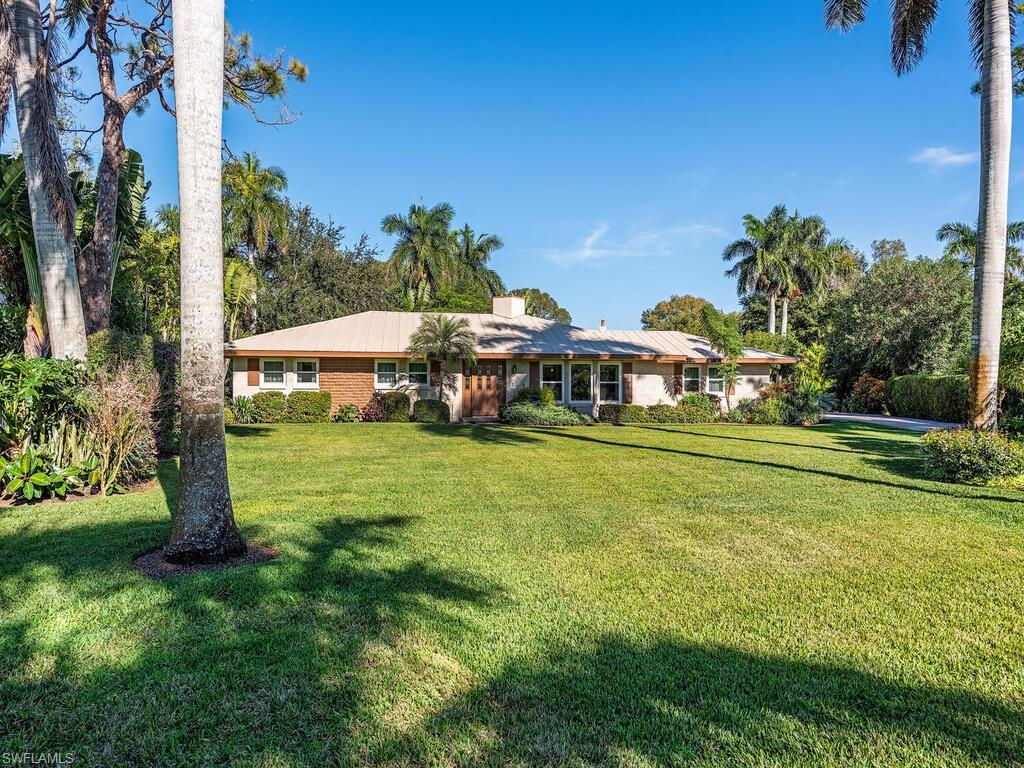 Move right in. High and dry lot  (Zone X) on a quiet street with only two homes. Original  Coquina Sands home from 1967 with new kitchen, famly room and 4th bedroom. Walk down Banyan Blvd  to the beach and shops.